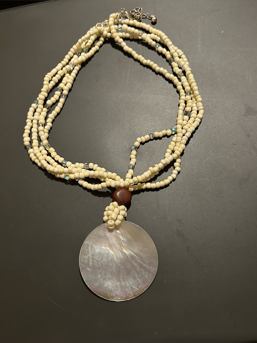 Tiny Iridescent Cream & Clear Multistrand Bead with Large Seashell Pendant